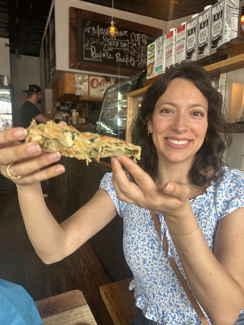 woman holding quiche
