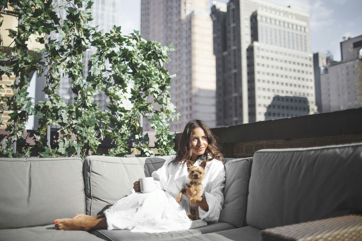 woman-in-spa-robe-with-dog-jpg