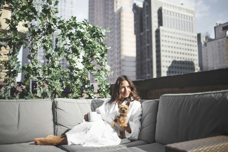 woman-in-spa-robe-with-dog-jpg