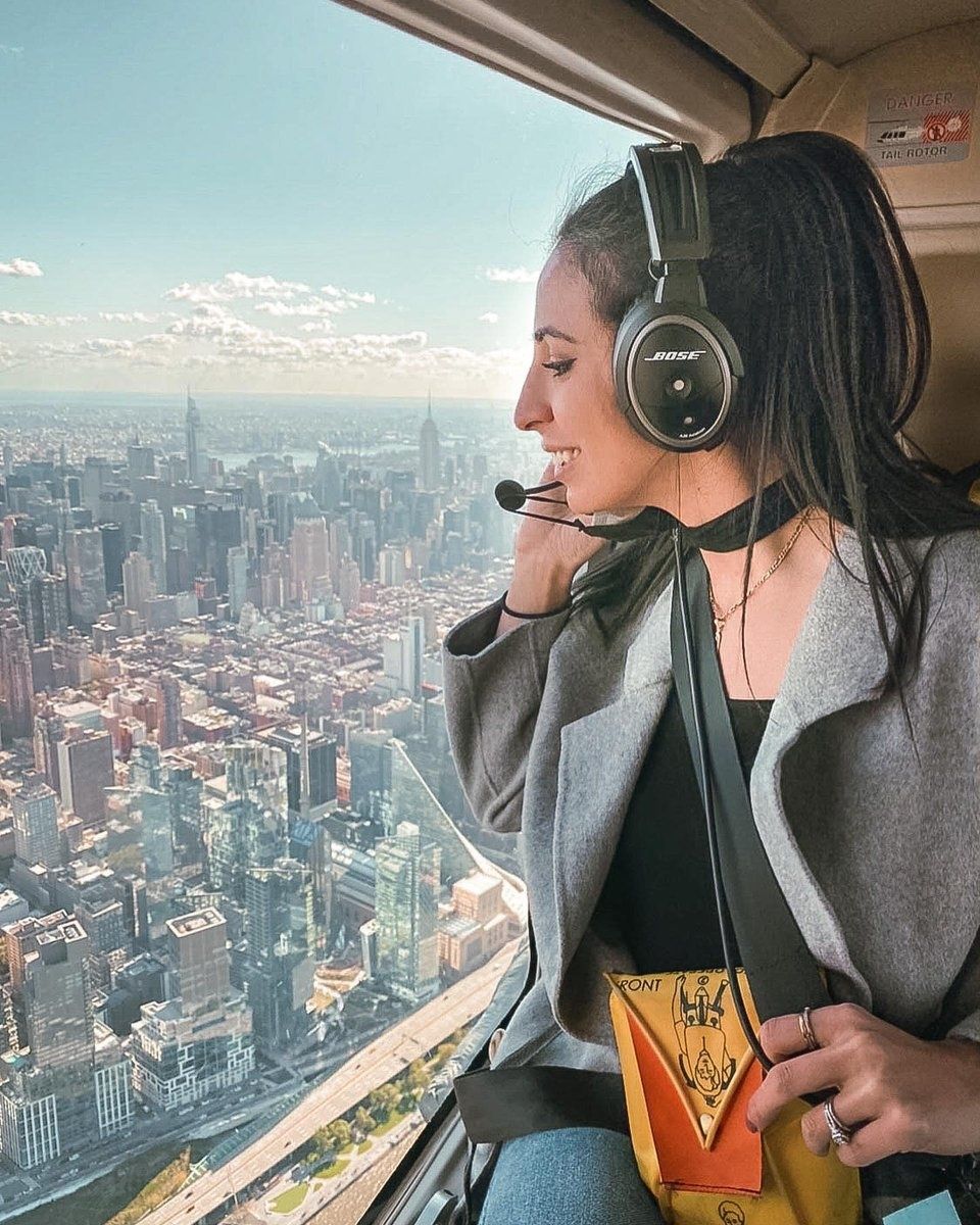 woman-looking-out-helicopter