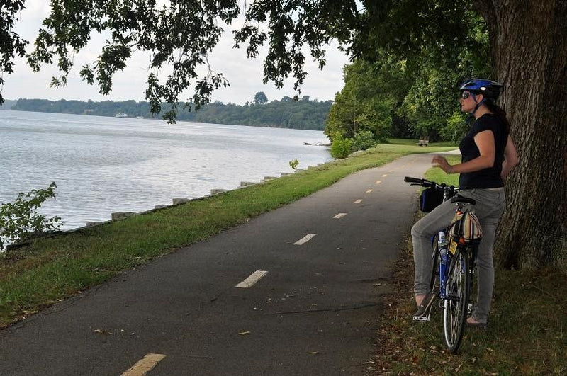 woman-on-bike-by-lake-in-dc-jpg