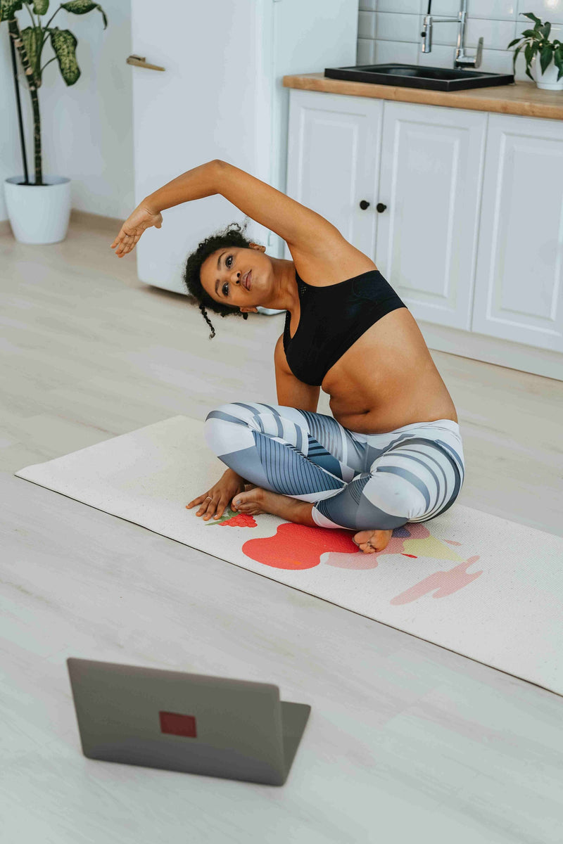 woman-stretching-during-virtual-yoga-class