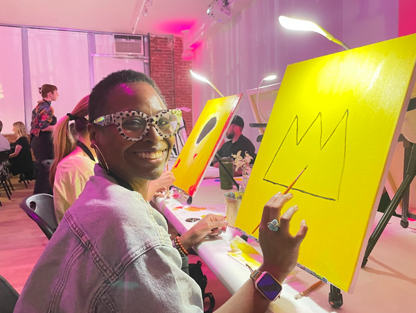 Woman with glasses painting.png