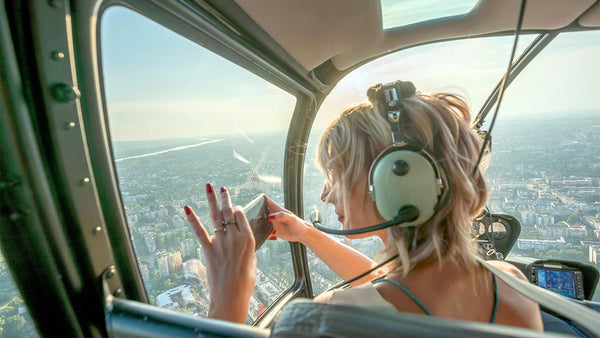 woman videoing Helicopter Tour.jpeg
