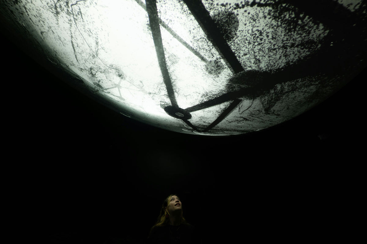 womane-looking-at-moon-installation
