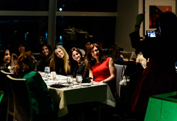 women getting photo taken on dinner cruise
