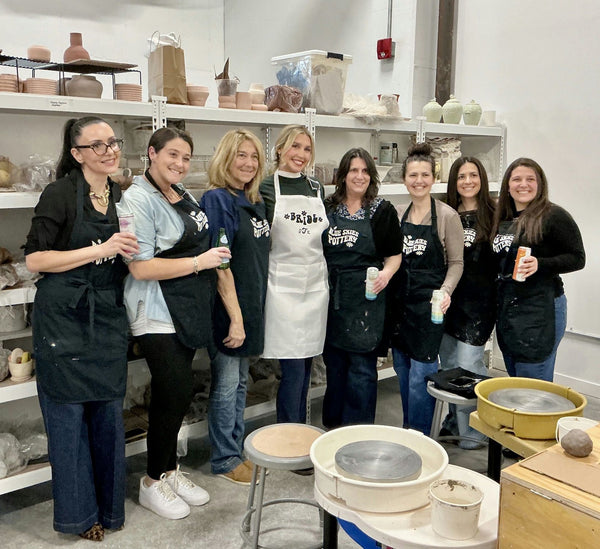 two women doing pottery