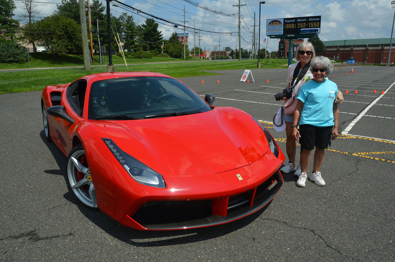 women with red car