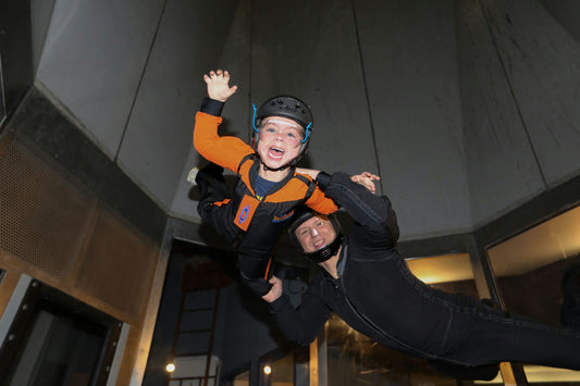 young child indoor sky diving