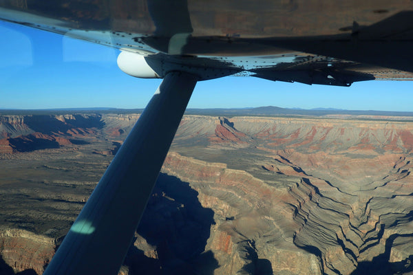 plane over canyon