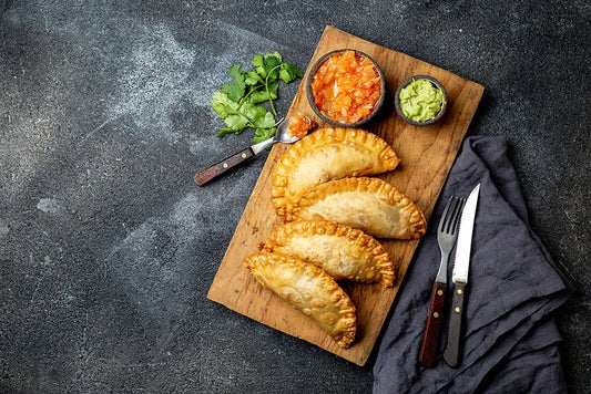 plated empanadas with sides