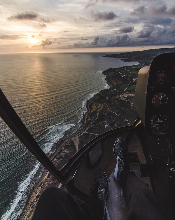 Side of helicopter over ocean